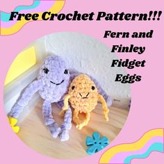 two crocheted stuffed animals sitting next to each other on a wooden surface with text overlay that reads free crochet pattern fern and findy fidget eggs