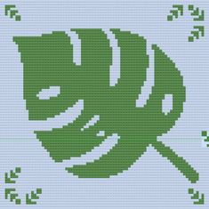 a cross stitch pattern with an image of a green fish on it's side