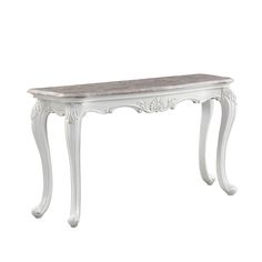 an antique white bench with marble top and carved legs, isolated against a white background