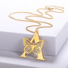 Adorn yourself with a touch of nature's beauty and personal elegance. Our delicate butterfly initial necklace, made from high-quality stainless steel, represents the perfect blend of charm and durability. Each pendant is crafted with care, ensuring it's not just a piece of jewelry but a meaningful accessory. Perfect for daily wear, special occasions, or as a heartfelt gift for loved ones. Stainless Steel Butterfly Necklace Gift, Butterfly Shaped Stainless Steel Necklace For Gift, Butterfly Shaped Stainless Steel Jewelry For Gifts, Butterfly Necklace Silver, Letter Necklace Gold, Initial Letter Necklace, Gold Letter Necklace, Personalized Pendant, Low Heel Shoes