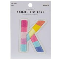 the iron on and sticker is multicolored in different colors, including one letter k