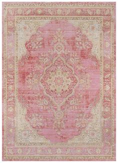 a pink rug with an ornate design on it