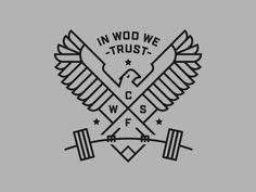 the logo for in wod we trust, with two dumbs and an eagle