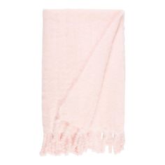 a light pink towel with fringes on the bottom and one end folded in half