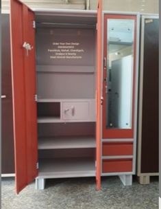 an open red and grey locker with its door opened to show the inside of it