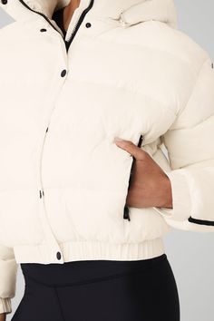 Your new outerwear obsession: the Aspen Love Puffer Jacket. Crafted with high-tech ripstop fabric, this regular-length puffer locks in warmth during cold weather months. Snap front buttons and side zip pockets keep this jacket on-trend while the removeable hood lets you adjust your cozy look as desired. Street-ready, water-resistant ripstop Designed & uniquely fit to flatter every size Wear-tested by our in-house team for the perfect fit Yoga Jacket, White Puffer, Ripstop Fabric, Yoga Shop, Ski Trip, Back Women, Winter Clothes, Alo Yoga, Light Jacket