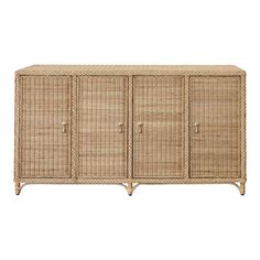 the sideboard is made out of wicker and has three doors on each side