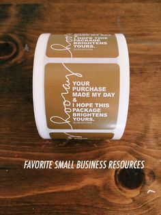 a close up of a roll of toilet paper on a wooden surface with the words favorite small business resources