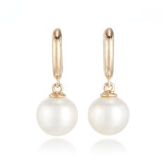 Our exclusive earrings feature white freshwater pearls playfully dangling from yellow gold huggie hoops. Since 1861, Gump's has been a destination for distinctive jewelry that offers a lifetime of enjoyment. To ensure each piece is created to our exacting standards, our expert in-house jewelry team oversees every step of the production process. The result is a statement of pure elegance. White freshwater cultured pearls, 9mm. 14-karat yellow gold. Pierced only. 1" long. Exclusive Earrings, White Pearl Earring, Pure Elegance, White Freshwater Pearl, Freshwater Cultured Pearls, Timeless Accessories, Pearl Size, Elegant Earrings, Cultured Pearls