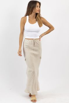 *SIGN UP FOR RESTOCK NOTIFICATIONS, ITEMS ARE RESTOCKED WHEN POSSIBLE BASED ON DEMAND* DESCRIPTION 100% Linen Maxi skirt, Drawstring waist detail, Linen, Cargo pockets Naomie is wearing a size small Height | 5'8 Dress size | 2 Please note: All items purchased on sale are final sale. We recommend checking your cart for sale items to make note of non-returnable items. Long Linen Skirt, Linen Maxi Skirt, Striped Linen Pants, Tan Skirt, Blue Vests, Embroidered Shorts, Linen Skirt, Knit Mini Dress, Back In Stock