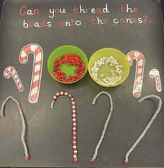 a tray with candy canes and candies on it that says can you thread the beads onto the criss?