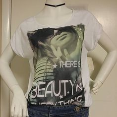 Super Lightweight Graphic Tee That Has A Low Cut Back In Mint Green Sheer Fabric. Never Worn! Casual Stretch Top With Sublimation Print, White Stretch Top With Sublimation Print, White Casual Top With Sublimation Print, Stretch Graphic Print Tops For Day Out, White Graphic Tee For Day Out, Spring Trendy Tops With Sublimation Print, Trendy Tops With Text Print For Day Out, Trendy Text Print Tops For Day Out, Sheer Fabric