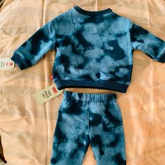 Boys Levi 2-Pc Blue Tie Dye Sweat Suit Fitted Blue Playtime Sets, Casual Blue Playwear Sets, Blue Fitted Playwear Sets, Fitted Blue Playwear Sets, Indigo Cotton Sets For Spring, Spring Cotton Indigo Sets, Spring Indigo Cotton Sets, Blue Cotton Long Sleeve Sets, Casual Navy Playwear Sets