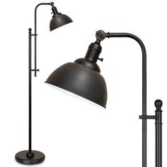 two black floor lamps with one light on each side and the other on top of it