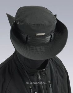 Type: Bucket hat Design: Techwear Material: Polyester Head circumference: 58cm Height: 10 Brim width: 7 Features: Water-resistant Wear it all year round Unisex Black bucket hat tactical The Tactical Bucket Hat is the perfect accessory for those who love both functionality and fashion. With its water-resistant material, this hat is perfect for outdoor and ensures that you stay dry in all weather conditions. The design is inspired by techwear fashion, giving it a stylish and modern look. With its Black Breathable Bucket Hat For Outdoor Activities, Functional Black Bucket Hat For Outdoor, Black Breathable Wide Brim Bucket Hat, Black Wide Brim Breathable Bucket Hat, Black Bucket Hat For Hiking, Black Breathable Wide Brim Hat, Black Wide Brim Hat For Hiking, Breathable Wide Brim Black Hat, Black Wide Brim Breathable Hat