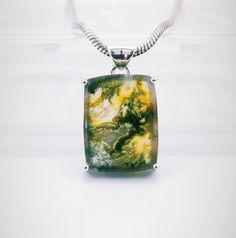 A beautiful handmade creation of Moss Agate Stone Pendant with Solid Sterling 925 Silver. We make our jewelry with fine quality of workmanship and high quality semi precious stones. This Beautiful Moss Agate Stone is from . This is a beautiful handmade creation.  Link for more Moss Agate Pendants - https://www.etsy.com/in-en/listing/1575071937/moss-agate-pendant-925-sterling-silver?click_key=b8c96c816df4e420e8d29bfcd1739ecc0d51af7b%3A1575071937&click_sum=2d135056&ref=shop_home_active_1&pro=1&frs Nature-inspired Agate Jewelry For Gifts, Adjustable Moss Agate Gemstone Jewelry, Ocean Jasper Gemstone Jewelry For Gifts, Ocean Jasper Gemstone Pendant Jewelry, Ocean Jasper Gemstone Pendant, Handmade Ocean Jasper Jewelry As Gift, Moss Agate Cabochon Pendant Jewelry, Nature-inspired Ocean Jasper Pendant Jewelry, Silver Agate Jewelry Hallmarked