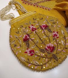 🌷🌷ITEM OVERVIEW🌷🌷 🌷If bought along side a Suit, the shipping is free. Please contact us for the discount coupon in that scenario.🌷 🌷 ATHARVA Hand Embroidered Potli Bags. Exclusive 3D. Yellow Women's Bag/Purse/Indian/Golden Dabke & Pearl Work/Pearl Work Handle/ Tassel 🌷 Dn: PB305 🌷Material: Chanderi/Dabka/Sequence/Pearl 🌷 Reds Antique Gold Embroidery 🌷Goes Well with our dress Collection 🌷Color Customization Available 🌷 Care: * Dry Clean/ Avoid direct Ironing on Embroidery Part. * You Festival Pearl Embroidered Pouch Shoulder Bag, Festive Rectangular Bag With Pearl Embroidery, Traditional Embellished Pouch Bag, Multicolor Embroidered Clutch With Handwork, Festive Rectangular Shoulder Bag With Pearl Embroidery, Festival Pouch Bag With Pearl Embroidery, Traditional Pearl Embroidered Clutch Shoulder Bag, Traditional Clutch Shoulder Bag With Pearl Embroidery, Traditional Clutch With Pearl Embroidery