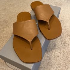 Cute Flat Tan Leather Everlane Sandal Thongs Buttery Soft Italian Leather Tapered Square Toe Just Tried On, Never Worn Excellent Condition See Photos For Measurements Size 5 Neutral, Versatile Shoe Comes With Box Tan Round Toe Flip Flops For Summer, Tan Leather Open Toe Flip Flops, Tan Flip Flops For Summer, Casual Tan Flip Flops For Spring, Tan Toe Post Sandals For Beach, Casual Tan Flat Flip Flops, Spring Toe Loop Flip Flops For Everyday, Everyday Toe Loop Flip Flops For Spring, Tan Open Toe Flip Flops For The Beach