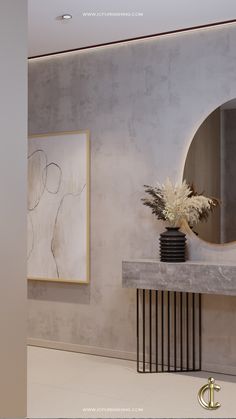 a vase filled with flowers sitting on top of a table next to a wall mounted mirror