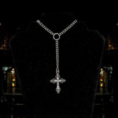 Forgive me father 🖤 This rosary inspired necklace features a curb style chain and a silver toned gothic style cross pendant with rhinestones.  Choose desired length when ordering. You can control whether you want to to fit tight or hang loose. Please take the time to measure your neck to ensure your satisfaction. Regardless of size chosen, there will be extra clasp rings attached to add a little more adjustable length.  Silver toned metals (silver plated chain) Lobster clasp closure  Handmade with love 🖤 Gothic Cross Pendant Clavicle Chain Necklace, Gothic Clavicle Chain Necklace With Cross Pendant, Gothic Metal Cross Pendant Jewelry, Gothic Cross Pendant Jewelry, Gothic Metal Cross Jewelry, Gothic Cross Metal Jewelry, Punk Style Metal Cross Jewelry, Gothic Jewelry With Cross Pendant And Adjustable Chain, Silver Cross Pendant Jewelry For Halloween