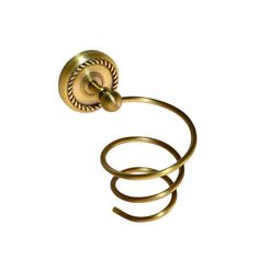 an old fashioned brass towel ring on a white background