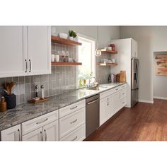 the kitchen is clean and ready for us to use in its new owner's home