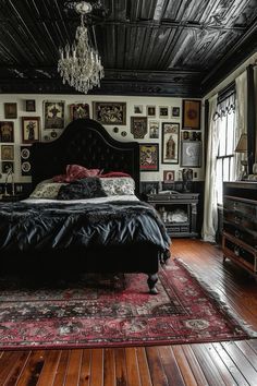 a bed sitting on top of a wooden floor next to a dresser and window covered in pictures