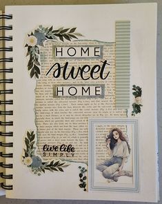 an open notebook with the words home sweet home written in black and white on it