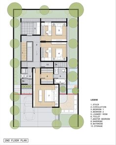 the floor plan for an apartment building with three floors and two levels, surrounded by green trees