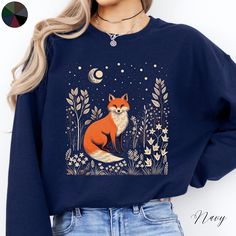 Fox and Moon Unisex Crewneck Sweatshirt | Boho Jumper | Cottagecore Clothes | Forest Animal Sweatshirt ✔️ Super comfy unisex heavy blend crewneck sweatshirt  ✔️ 50% cotton 50% polyester ✔️ Medium-heavy fabric (8.0 oz/yd² (271.25 g/m ✔️ No side seams ✔️ Ribbed knit elastic collar to help collar retain its shape ✔️ Sewn-in label 📏 Runs true to size ✨ Care instructions: Machine wash: cold (max 30C or 90F). Turn inside out before washing to protect the print. Non-chlorine: bleach as needed. Tumble Fox And Moon, Autumn Jumpers, Cottagecore Clothes, Boho Pullover, Fox Sweater, Animal Sweater, Fox Gift, Animal Sweatshirt, Forest Animal