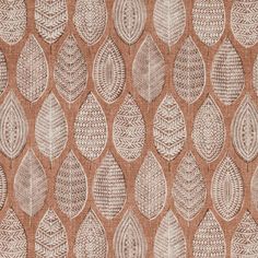 a brown and white wallpaper with leaf designs on the side, as well as an orange background