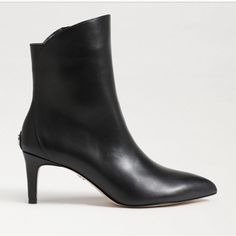 Make Your Look Extra Sleek With Our Usha Bootie, Teaturing A Pointed Toe And Stiletto Heel. Heel Height: 2.5 Inches Toe: Pointed Toe Closure: Zipper Boot Shaft: 5.3 Inches Calf Circumterence: 10.2 Inches Material: Leather Insole: Synthetic Black In Color Size 6.5 New Without Box Elegant Pointed Toe Booties With Stacked Heel, Elegant Low Heel Booties With Stacked Heel, Elegant Booties With Stacked Heel And Pointed Toe, Elegant Booties With Stacked Low Heel, Elegant Formal Booties With Low Heel, Formal Low Heel Booties With Reinforced Heel, Elegant Pointed Toe Booties Medium Width, Chic Business Boots With 4-inch Heel, Elegant Low Heel Medium Width Booties