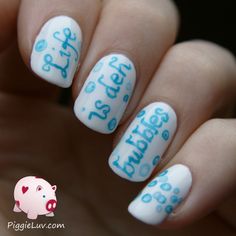 I had the song 'Under The Sea' from the Disney movie The Little Mermaid stuck in my head so I wrote part of the lyrics down on my nails :-p Sebastian sings 'Life is deh bubbles!" And he has kind of an accent so I wrote it like an accent. Hahaha! Check my blog for a simple how-to on making the bubbles, it's really easy! Little Mermaid Nails, Disney Themed Nails, Disney Song, Spring Nail Trends, Hard Nails, Mermaid Nails