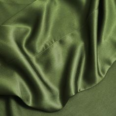 the fabric is very soft and shiny green