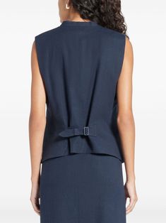 Find VINCE V-neck Waistcoat on Editorialist. navy blue linen blend V-neck front button fastening sleeveless chest welt pocket two side welt pockets adjustable strap to the rear straight hem This item contains at least 50% materials which are certified or widely recognised as having a lower environmental impact through production and/or manufacturing processes that reduce water consumption and the use of harmful chemicals, or re-use by-products of the production process. Learn more about what makes a product Conscious on our Conscious Criteria page Elegant Stretch V-neck Vest, Luxury V-neck Vest For Tailoring, Chic V-neck Vest With Button Closure, Blue Denim V-neck Vest, Cotton V-neck Vest With Button Closure, Navy Blue Linen, Water Consumption, Welt Pocket, Linen Blend