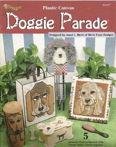 the front cover of plastic canvass doggie parade, featuring three dogs and two purses