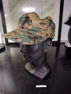 A US Marine Corps issued Marpat digital camouflage garrison cap! The size is either SMALL or Xtra SMALL, its hard to read the tag. The condition is good and it is ready to display or wear. The hat you see in the pictures is the hat you will get in the mail! FREE US SHIPPING! SIZE: Small -OR- X-Small (SEE PICS!) The hat you see in the pictures is the hat you will get in the mail! FREE US SHIPPING! Military Style Camouflage Flat Cap, Military Style Outdoor Hat, Military Camouflage Hat With Curved Brim, Adjustable Camouflage Military Hat, Adjustable Military Camouflage Hat, Military Camouflage Cap, Military Style Camouflage Cap, Military Style Camouflage Visor Hats, Garrison Cap