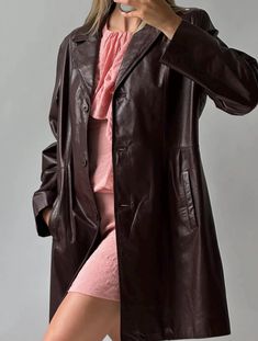 Elevate your outerwear collection with our Women's Burgundy Long Trench Coat. Combining luxury, functionality, and sustainability, this coat is perfect for the modern woman who values style and quality. Whether you're dressing for a formal occasion or adding a touch of sophistication to your everyday outfits, this coat will be your go-to for years to come. Whether you're running errands, heading to the office, or enjoying a night out with friends, our Women's Burgundy Long Trench Coat is the per Elegant Brown Leather Long Coat, Elegant Long Brown Leather Jacket, Classic Burgundy Leather Outerwear, Elegant Brown Leather Jacket With Button Closure, Elegant Burgundy Outerwear With Button Closure, Trenchcoat Style, Trench Coat Style, Classic Trench Coat, Leather Trench