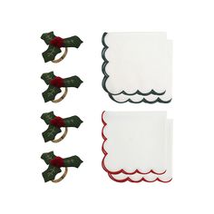 four napkins with bows and holly on them