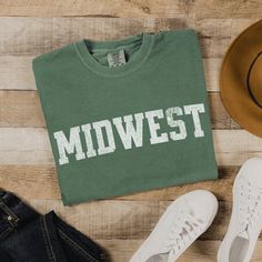 Midwest Varsity Style Tshirt, Simple Midwest Comfort Colors Tee .: The relaxed fit keeps the wearer comfy in both casual and semi-formal settings while the crew neckline delivers that classic, neat style which makes it perfect for accessorizing. What's more, the pre-shrunk fabric ensures a consistently great fit. .: Made using 100% US cotton that is ethically grown and harvested. Gildan is also a proud member of the US Cotton Trust Protocol ensuring ethical and sustainable means of production. Casual Shirt With Comfortable Fit And Crew Neck, Casual Fall Shirt For College, Casual Fall College Shirt, Casual Cotton Shirt For College, Casual Shirt With Text Print And Comfortable Fit, Classic Letter Print Tops For College, Spring Crew Neck Shirt For Casual Gatherings, Casual Pre-shrunk Shirt For Everyday, Spring Casual Crew Neck Shirt