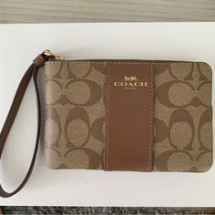 Brand New, Never Used With Detached Tag As Shown In Photo. Chic Brown Rectangular Wristlet, Chic Everyday Brown Wristlet, Chic Brown Coach Wristlet, Chic Brown Wristlet With Removable Pouch, Chic Brown Coach Clutch, Coach Wristlet, Signature Canvas, Wristlets, All Colors