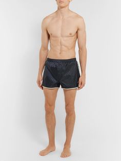 Made from lightweight jacquard-shell woven with the brand's 'GG' motif, these shorts are cut in a short length and outlined with grey piping. Of course, no Gucci design would be complete without a signature touch of Alessandro Michele's, so there's an embroidered gold bee at the hem. Luxury Beachwear Bottoms With Built-in Shorts, Luxury Beachwear Shorts With Built-in Shorts, Gucci Collection, Gold Bee, Alessandro Michele, Shorts For Men, Printed Swim, Navy Shorts, Drawstring Waistband