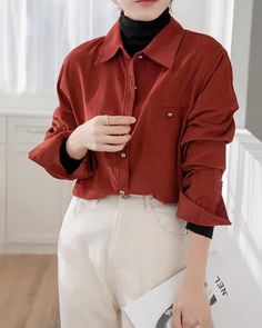 Long sleeve blouse with a relaxed boyfriend fit, gold buttons and suede corduroy texture to create a cozy vintage vibe. S: 17.5" across shoulders, 39" chest, 24" lengthM: 18" across shoulders, 40.5" chest, 24" lengthL: 18.5" across shoulders, 42" chest, 24.5" lengthXL: 19" across shoulders, 43.5" chest, 24.5" length Fall Corduroy Shirt With Buttons, Winter Cotton Blouse With Buttons, Trendy Fall Shirt With Buttoned Pockets, Long Sleeve Corduroy Tops With Buttons, Trendy Shirt With Buttoned Pockets For Fall, Fall Shirt With Solid Color And Buttoned Pockets, Corduroy Long Sleeve Tops With Buttons, Shirt With Buttoned Pockets For Fall, Solid Shirt With Buttoned Pockets For Fall