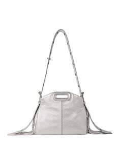 Find MAJE Miss M Mini Bag on Editorialist. The Maje Miss M Mini Bag is crafted from leather. The bag features a top handle, a detachable and adjustable shoulder strap, a push lock closure, and fringe detailing. It has a polyester lining. Silver Leather Top Handle Shoulder Bag, Silver Leather Satchel With Double Handle, Silver Leather Shoulder Bag With Detachable Handle, Silver Leather Double Handle Satchel, Silver Leather Satchel With Handles, Silver Satchel With Adjustable Strap And Top Handle, Silver Crossbody Satchel With Top Carry Handle, Silver Satchel With Double Handle And Top Carry Handle, Silver Leather Satchel With Top Carry Handle