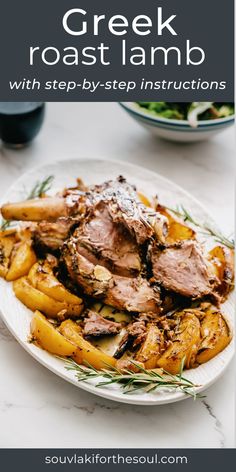 a white plate topped with roast lamb and potatoes