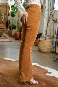 Get your flare-on with these Jane Corduroy pants from Jade! They're the ultimate in stylish comfort (and who doesn't love a good pun?). So go ahead, flaunt your style and comfort in these quirky, playful flares. High-waist elasticized backband Available in Black and Camel Stretched corduroy fabric Tab button closure Belt loops Flared silhouette Imported Corduroy Flare Pants, Best Puns, Platform Flats, Flying Monkey Jeans, Corduroy Fabric, Judy Blue Jeans, Plus Size Swimwear, Go Ahead, Sweater Blouse