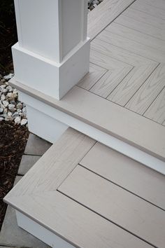 two white wooden steps next to each other