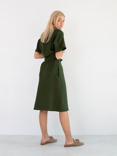 "SUMMER is a short sleeve true wrap closure linen wrap dress. DETAILS - True wrap closure - Dolman style sleeves - Knee length - 100% lightweight European linen fabric - Cut and sewn to order just for you in our studio COLOR - Forest Green, you can also choose other colors above - Fabric samples are available here https://www.etsy.com/listing/586569696/linen-fabric-samples SIZING & FIT - Relaxed fit - True to size - Measurements taken from a size S - Model is 5'8\" / 173cm and wearing a size Green Short Sleeve Wrap Dress, Green Short Sleeve Wrap Dress For Beach, Green Linen Summer Dress For Work, Green Summer Wrap Dress, Casual Green Wrap Dress, Casual Summer Linen Wrap Dress, Short Sleeve Linen Dress With Tie Waist For Work, Green Knee-length Wrap Dress For Summer, Summer Linen Dress With Short Sleeves And Tie Waist