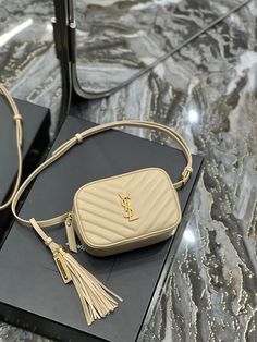 Description S.L Lou Belt Bag Beige In Matelassé Gold Toned Hardware For Women 6.1in/15cm YSL 614031DV7072721 Rep 1:1 Size: 15,5 x 10,5 x 5,5 cm / 6.1 x 4.1 x 2.1 iches (Length x Height x Width ) Beige Zip closure Adjustable buckle closure Gold toned hardware Includes box, dust bag. This product is of the best quality. Yves Saint Laurent Bags, Luxury Products, Saint Laurent Bag, Belt Bag, Evening Bags, Real Leather, Contact Us, Yves Saint Laurent, Fashion Bags