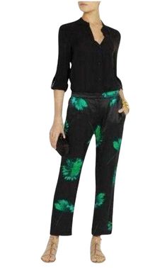 Green and black floral-print silk satin pants. Flat front, cased elasticized waist at backTwo on-seam pockets, two button-through pockets at backPiping at leg sides. Approximately 10" rise, 25" inseam, 16" leg opening. Button fly and bar-and-hook closure. 100% Silk. Dry clean.Fits true to size, take your normal sizeMid-rise, straight-leg fitCropped lengthPartially elasticated at the waist for a flexible fitMade in Portugal. Chevron Outfit, Satin Pajama Pants, Clean Fits, Satin Trousers, Satin Pants, Silk Trousers, Luxury Women Fashion, Satin Pajamas, Printed Silk